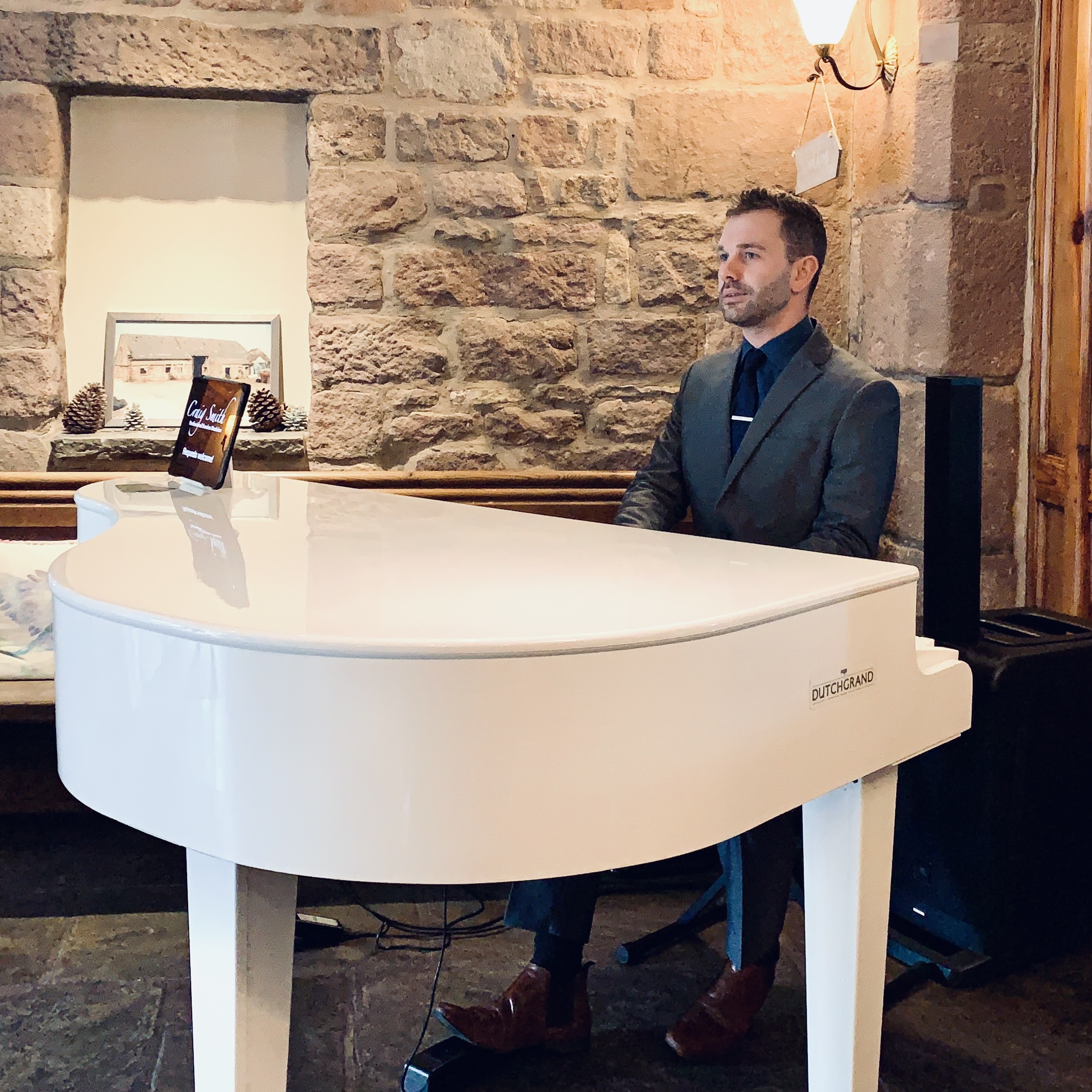 Wedding pianist Craig Smith performs for a Beeston Manor wedding reception