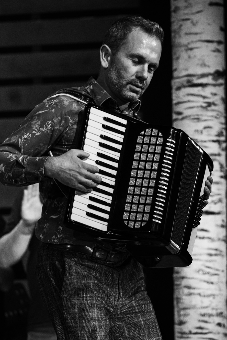 Craig plays accordion during the finale of musical show 'Come From Away'